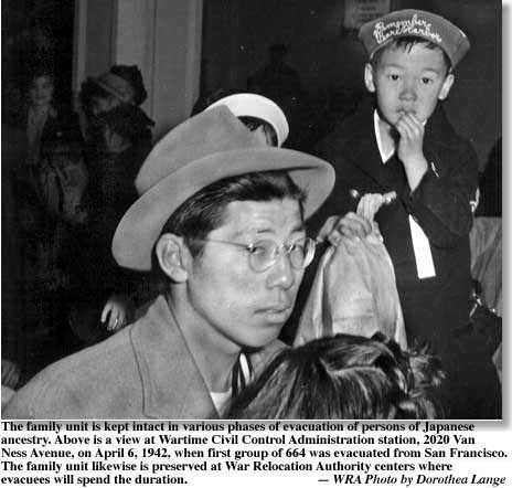 Father and son awaiting deportation to internment camp. Young boy wears Remember Pearl Harbor hat