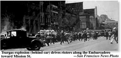 teargas drives rioters along the Embarcadero toward Mission St.