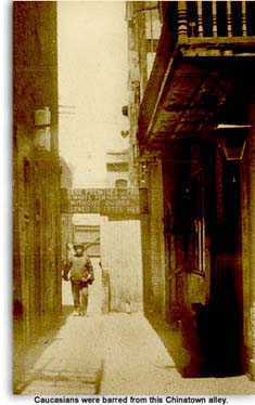 Sign says white persons, with or without guides, are barred from this Chinatown alley